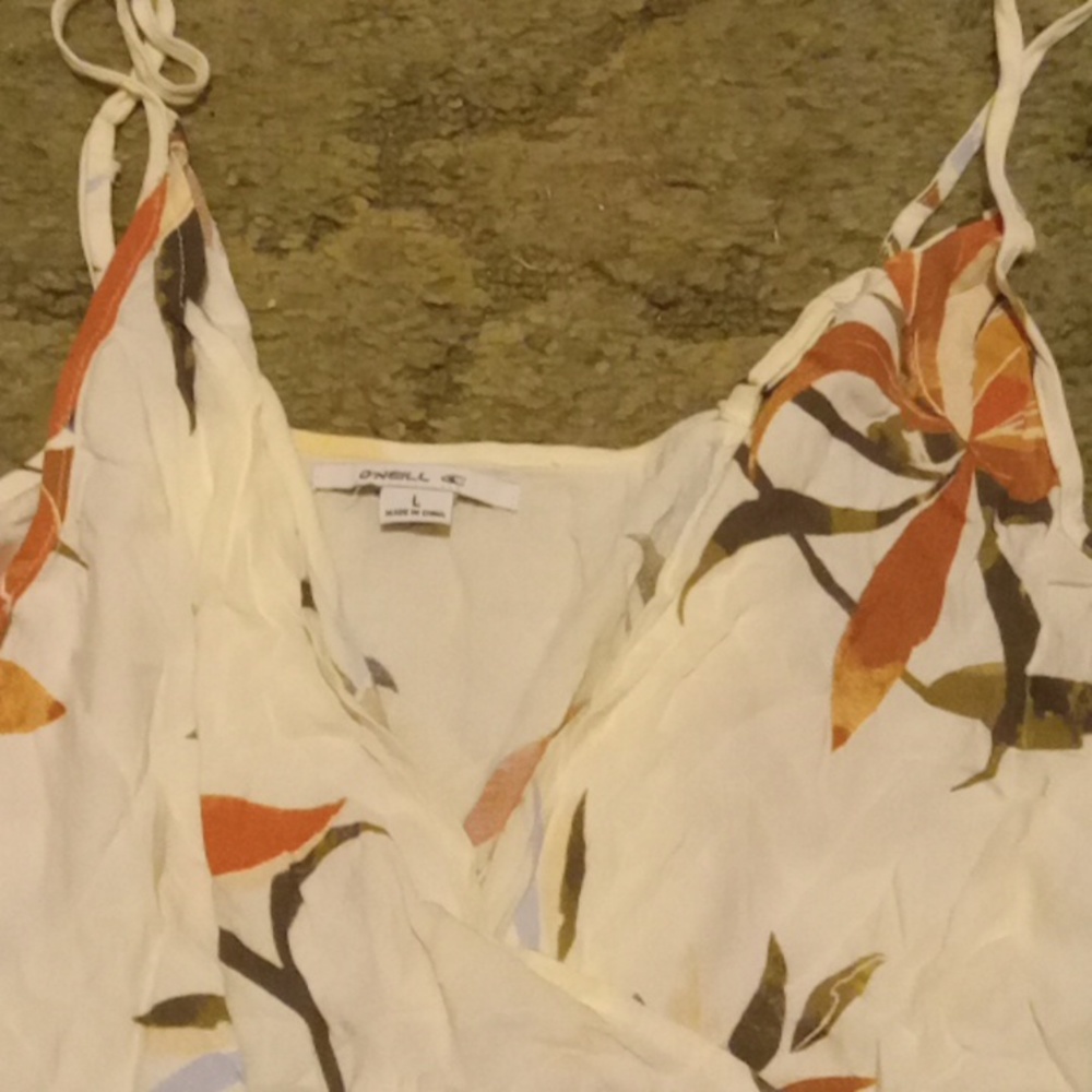 Women O'neill floral tassel shirt size large